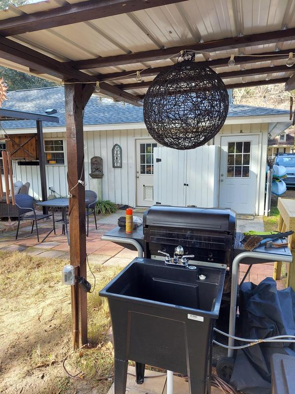 Blank sink outdoors near a grill